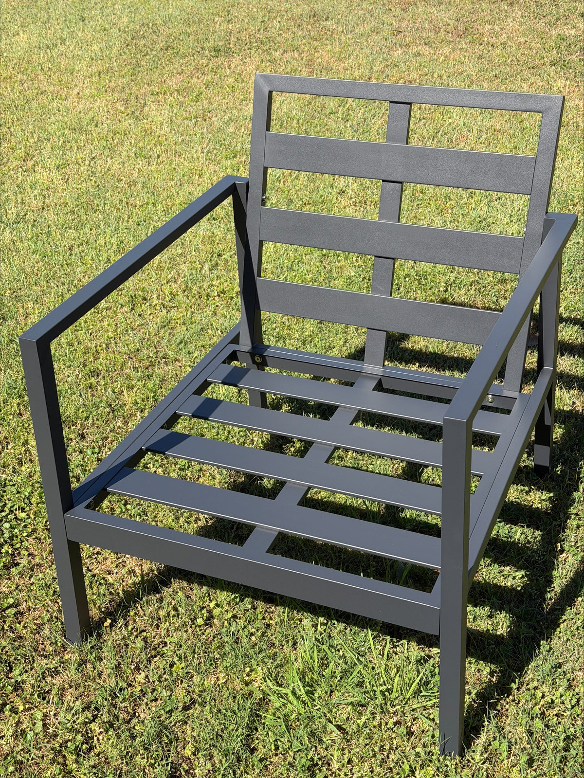 Noosa Double 4 Piece Lounge Set - Gunmetal single armchair frame - angled view